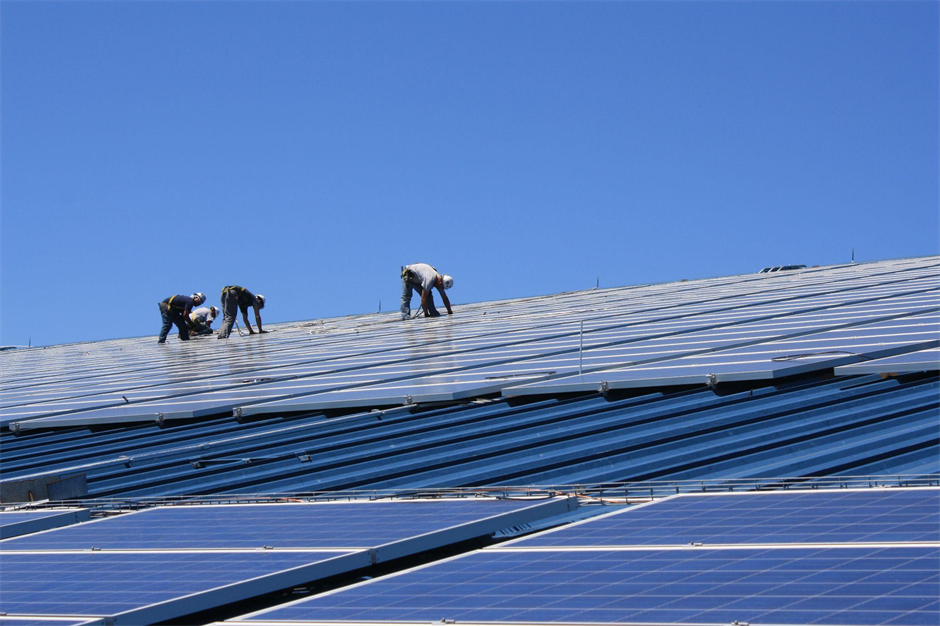 Solar panel suppliers inspecting the roof